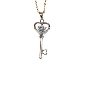 DIJE LLAVE CON ZIRCON 18K