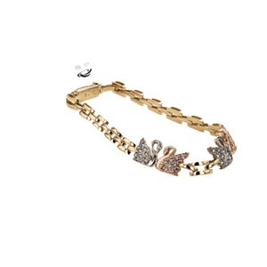 PULSERA CISNE CON ZIRCONES 18K