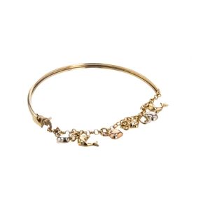 PULSERA MEDIA CAÑA CON DIJES 18K
