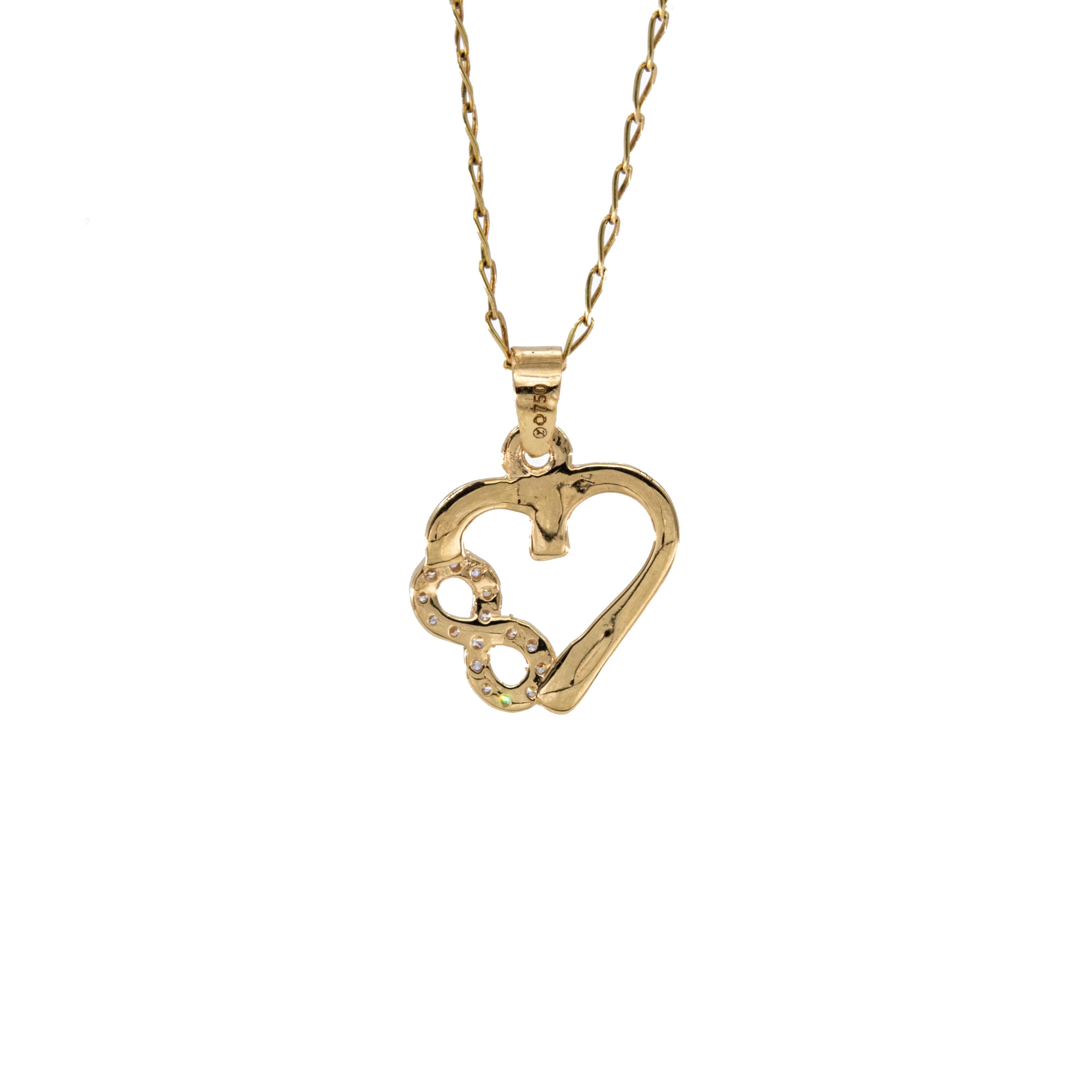 DIJE CORAZON CON ZIRCONES 18K